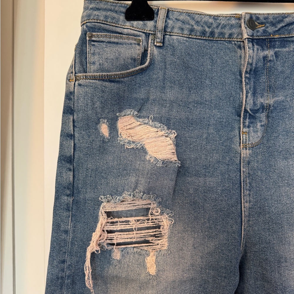 Distressed Light Blue Denim Jeans
